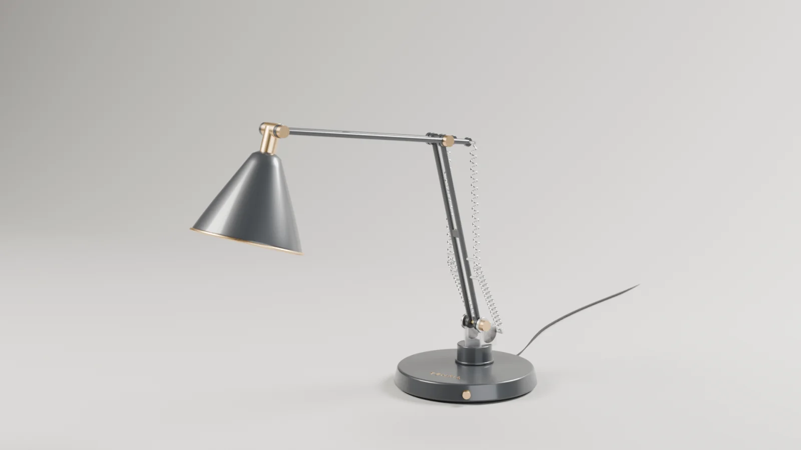 Lampe TENSIL graphite et laiton sur fond studio, vue héros