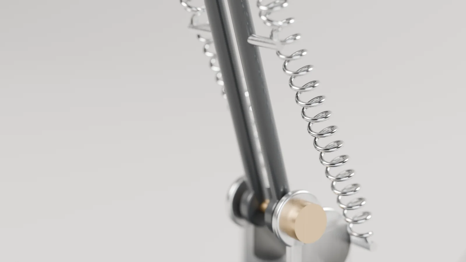 Gros plan sur un ressort et une articulation de la lampe